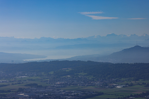 aerial view of famous Uetliberg in Zurich, swiss alps in background