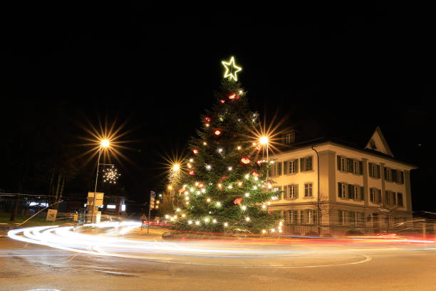 istock outdoor christmas tree in a roundabout at night 1822507417
