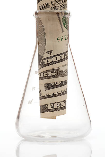 istock Us dollar in laboratory tube 182250923