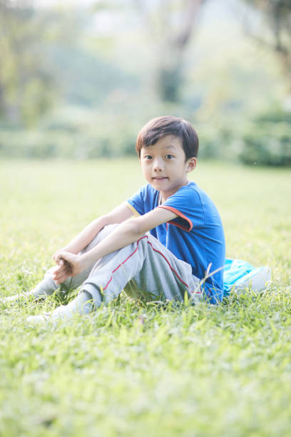 istock A little boy playing in the park 1822527615