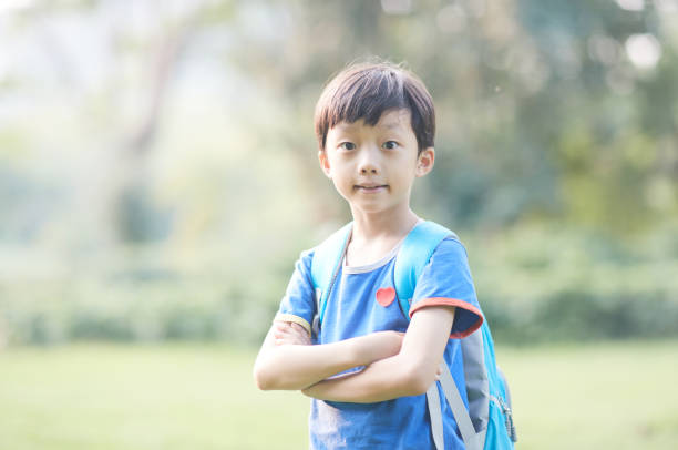 istock A little boy playing in the park 1822529178
