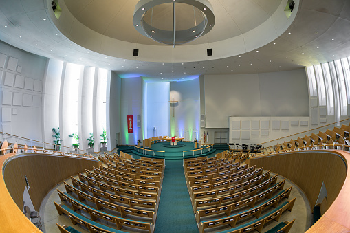 Columbus, Indiana, USA - October 30, 2023: Interior nave and sanctuary of the contemporary St Peter's Lutheran Church in Columbus