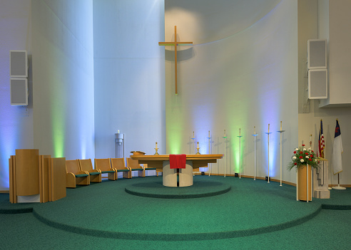 Columbus, Indiana, USA - October 30, 2023: Altar and sanctuary of the contemporary St Peter's Lutheran Church in Columbus