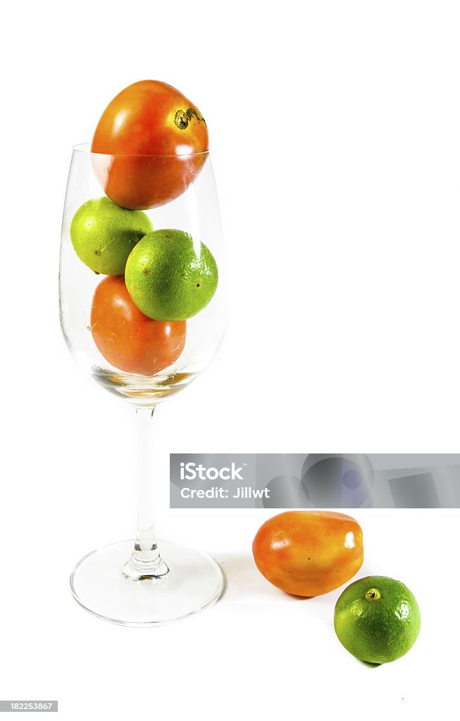 Tomaten und Zitrone in Wein Glas - Lizenzfrei Alt Stock-Foto