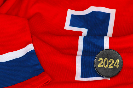 Hockey uniform and puck closeup. Hockey season, concept