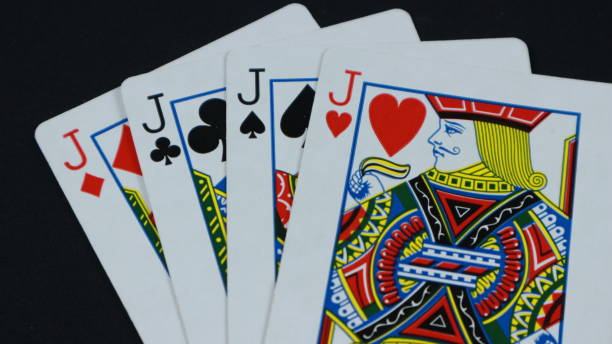 istock 4 Jack in a row - Playing Cards, Isolated on black 1822568289