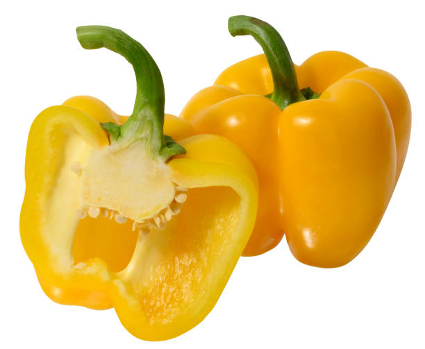 istock Half and whole yellow pepper on white isolated background 1822575228