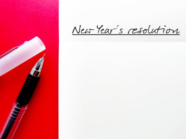 istock Notebook with handwritten text New Year's resolution - a self promise to start doing something good, make life better, or stop bad habits in the coming new year 1822591791