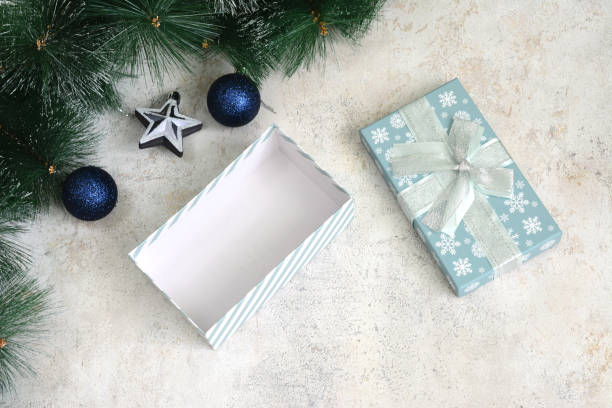 istock gift box for christmas with spruce branches and christmas spheres 1822611006