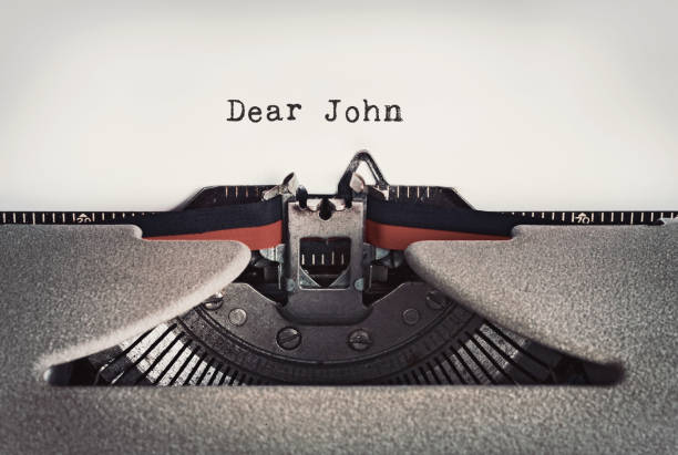 istock Old-fashioned typewriter begins to type a Dear John letter 1822626322