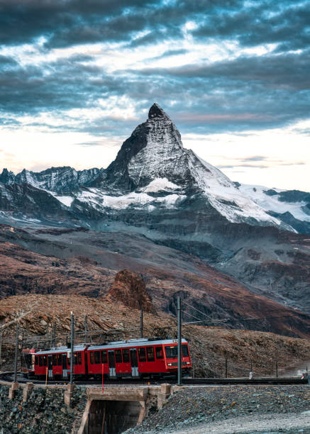 istock Electric train running on railway through Matterhorn mountain in Gornergrat station 1822651803