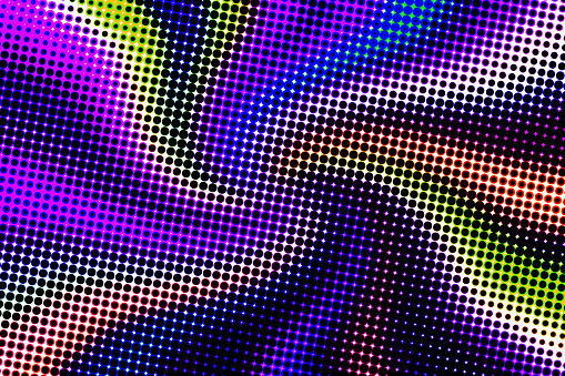 Abstract pixelated half tone dots wavy background.