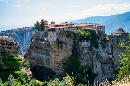 Amazing view of Monastery in Meteora Kalambaka Greece. Photo of famous active Meteora Orthodox monastery in the summer. Meteora is on UNESCO heritage list.