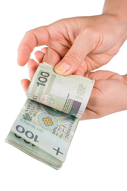 istock Hand with money isolated on white background 182268517