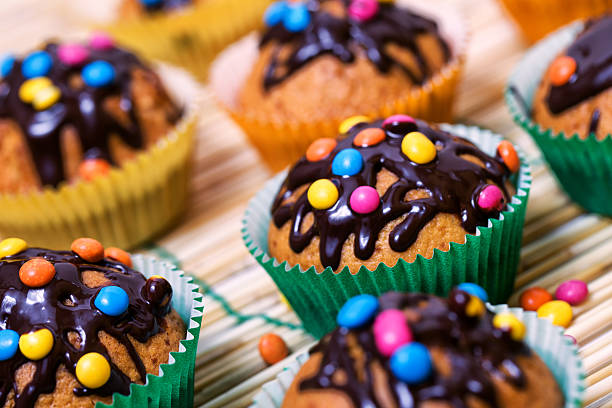 Muffin with chocolate glaze and smarties