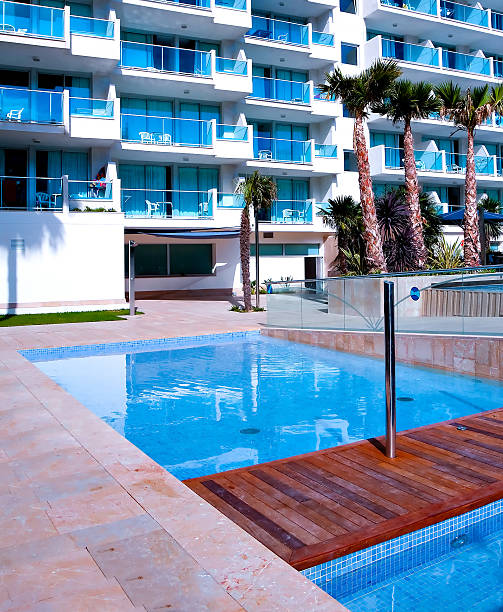 istock sunny lounge near the pool 182270113