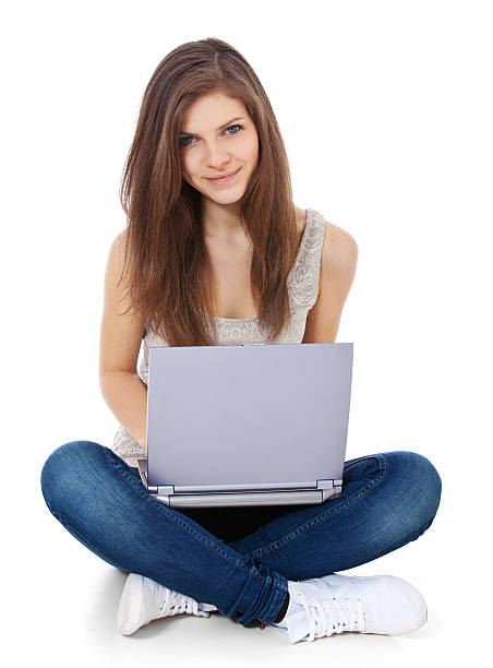 istock Teenage girl using laptop 182270752