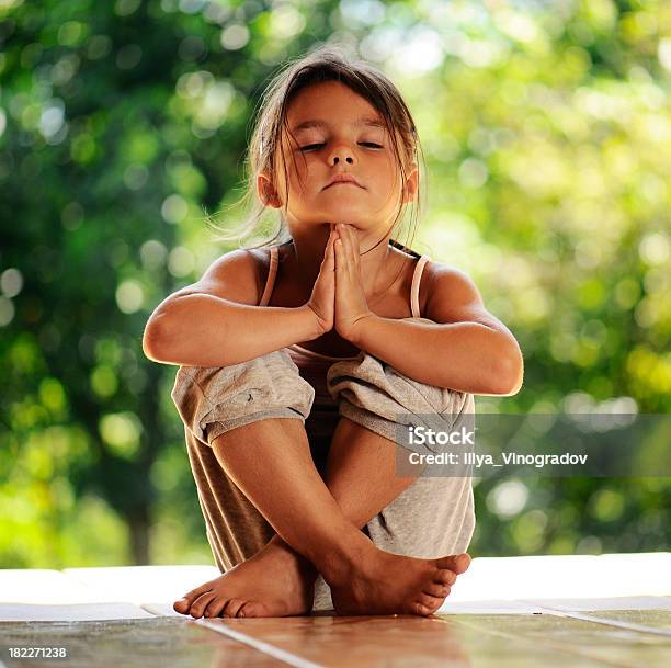 Girl On Meditation In The Morning Park Stock Photo - Download Image Now - Child, Meditating, Yoga