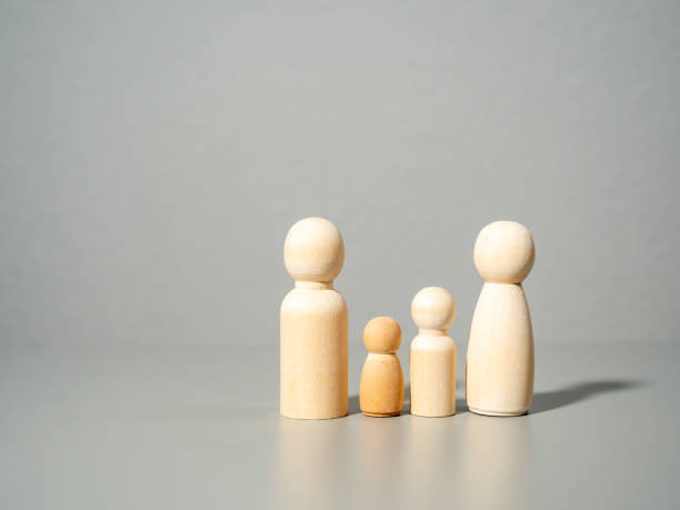 istock Wooden figures. Family on a gray background. 1822719577