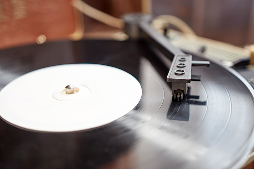 Vinyl record player. Needle player close up. Retro vinyl record player.