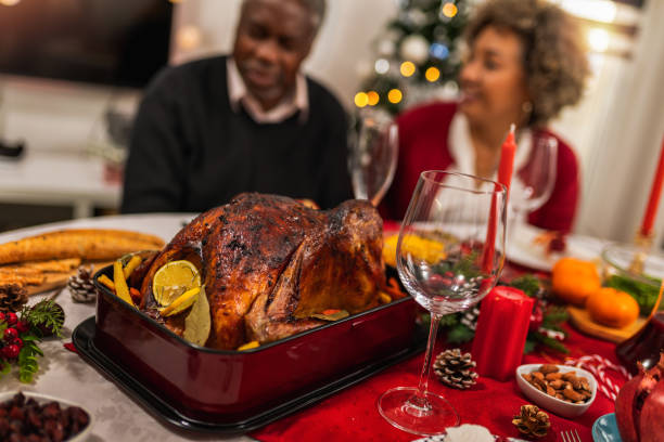 istock Roasted turkey served on the dining table for family Christmas dinner. 1822749388
