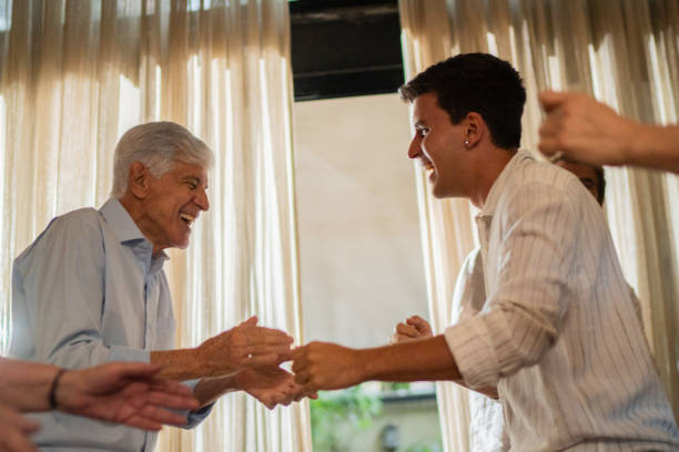 istock Grandfather and grandson dancing at home 1822789321