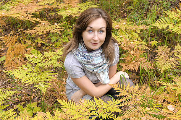 istock Beautiful woman in autumn forest 182279450