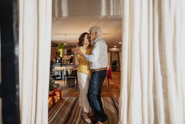 istock Happy senior couple dancing at home 1822797559