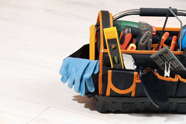istock Bag with different tools for repair on white wooden table, space for text 1822836219