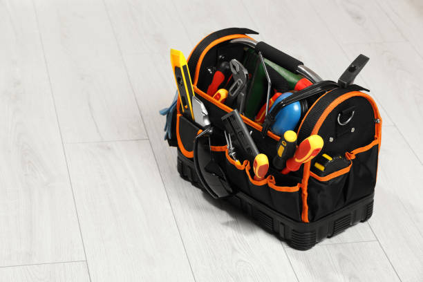 istock Bag with different tools for repair on white wooden table, space for text 1822837831