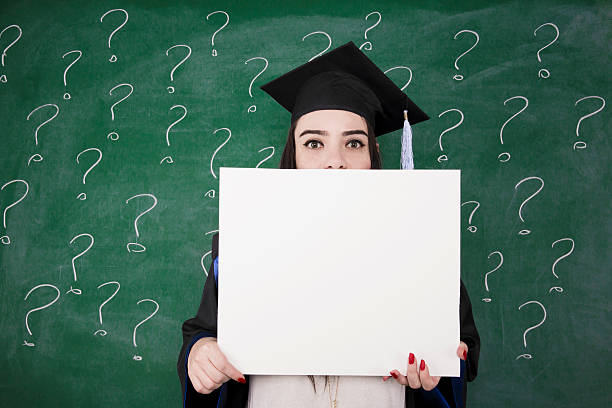 istock Graduate Girl With Banner 182284243
