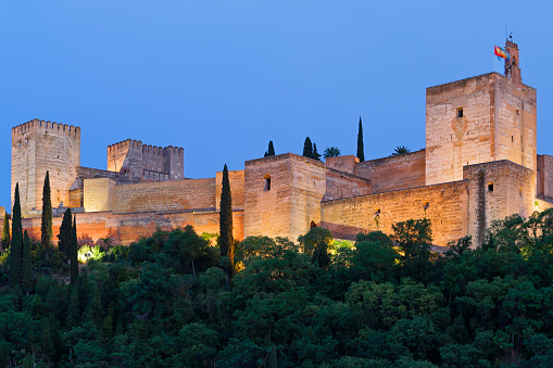 Panorama view of the Alhambra in Granada on a clear Spring night, a palace and fortress complex that remains one of the most famous monuments of Islamic architecture.