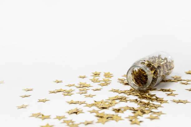 istock Golden stars spilled from a jar 1822862313