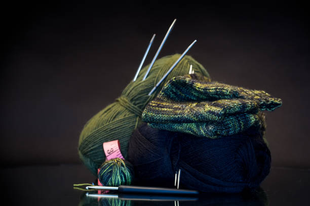 istock wool yarn, knitting needles and other tools for hand knitting. 1822863479