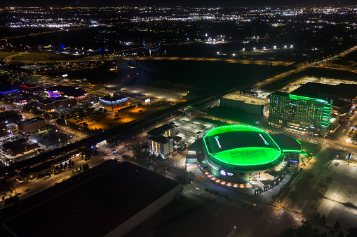 Oklahoma City, USA - October 25th, 2023: Night aerial view of the beautiful downtown cityscape, Oklahoma City Paycom center.