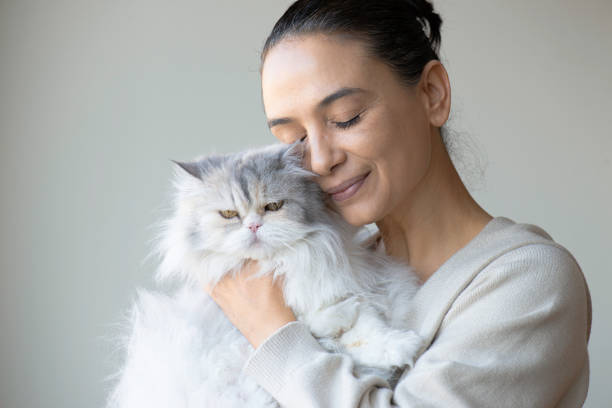 istock Woman hugging her cat 1822884542