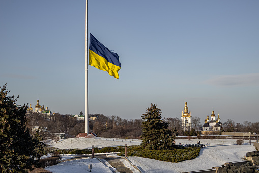 Kyiv, Ukraine. November 30, 2023: the flag of Ukraine is being raised in the historical museum.