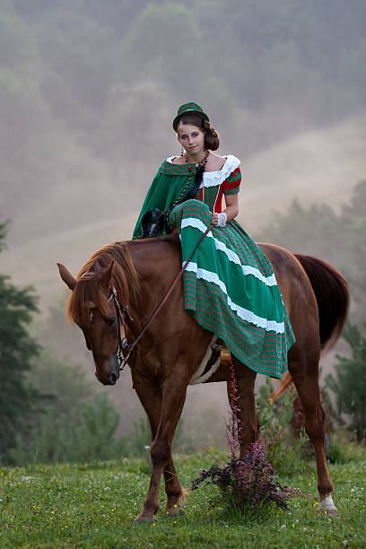istock Girl riding equestrian classicism dress 182290441
