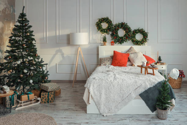 istock Bed with New Year's decorations. New Year's interior. Christmas tree 1822905933