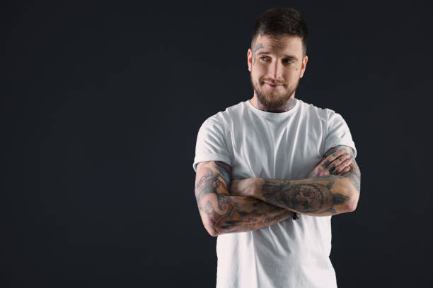 istock Handsome hipster man on black background. Space for text 1822919255