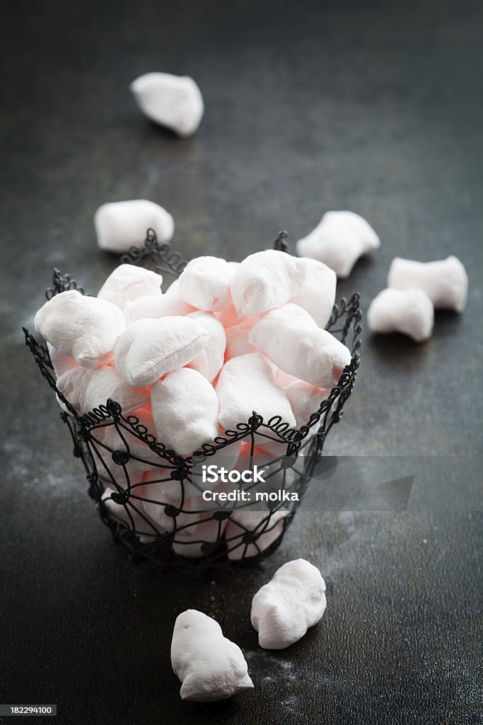 Marshmallow Homemade pink marshmellows on dark rustic background Candy Stock Photo