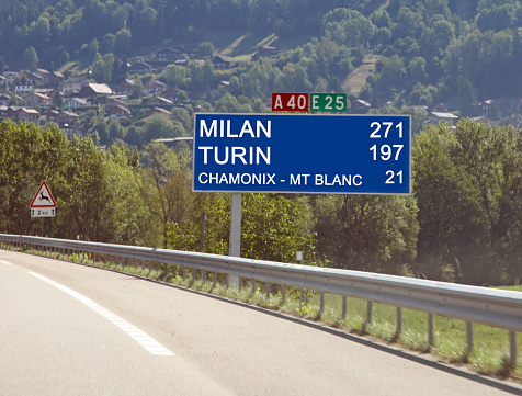 Road signs on the French highway to reach italian cities  through the Mont Blanc tunnel
