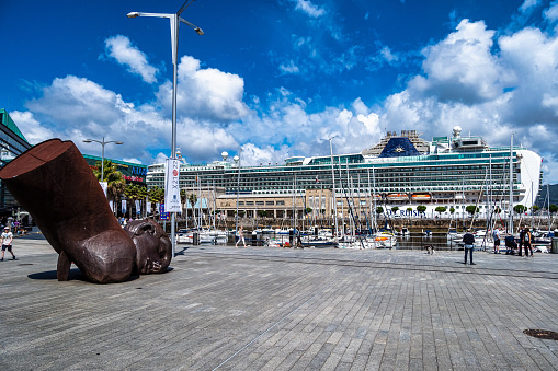 Vigo, Spain - Jun 29, 2023: Port of Vigo in Galicia, Spain, Europe with head of El Banista del Arenal sculpture by Leiro
