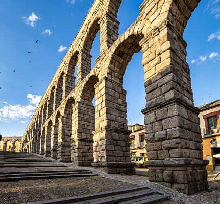 Segovia, Spain - Jul 06, 2023: Roman Aqueduct of Segovia, one of the best-preserved elevated Roman Aqueducts and a symbol of Segovia. Castile and Leon, Spain.