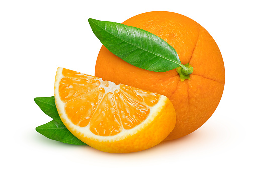 Whole and slice of orange with leaves on an isolated white background.