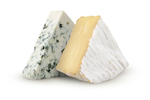 Brie cheese and blue cheese on an isolated white background.