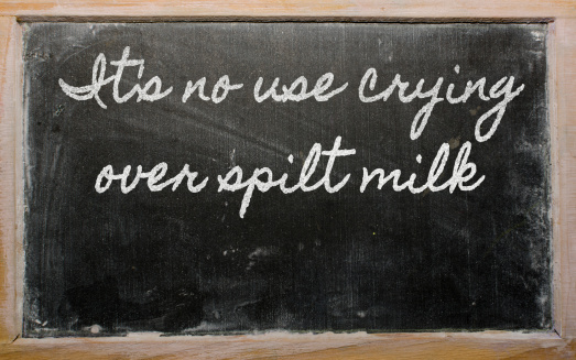handwriting blackboard writings - It's no use crying over spilt milk