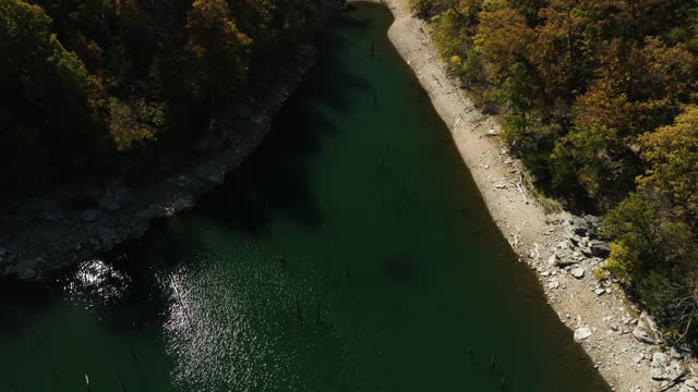 Aerial Drone View Of A Lake With Pilings Near Eagle Hollow Cave In Bland, Arkansas, USA.