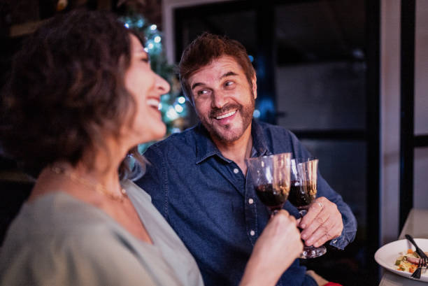 istock Mature couple on celebratory toast at Christmas dinner 1823034331