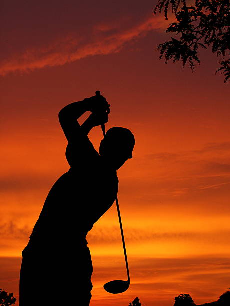 Golf Sunset Silhouette Golf Sunset Silhouette night golf stock pictures, royalty-free photos & images